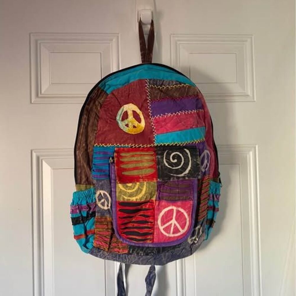 Peace sign patchwork backpack NWOT Festival Wear